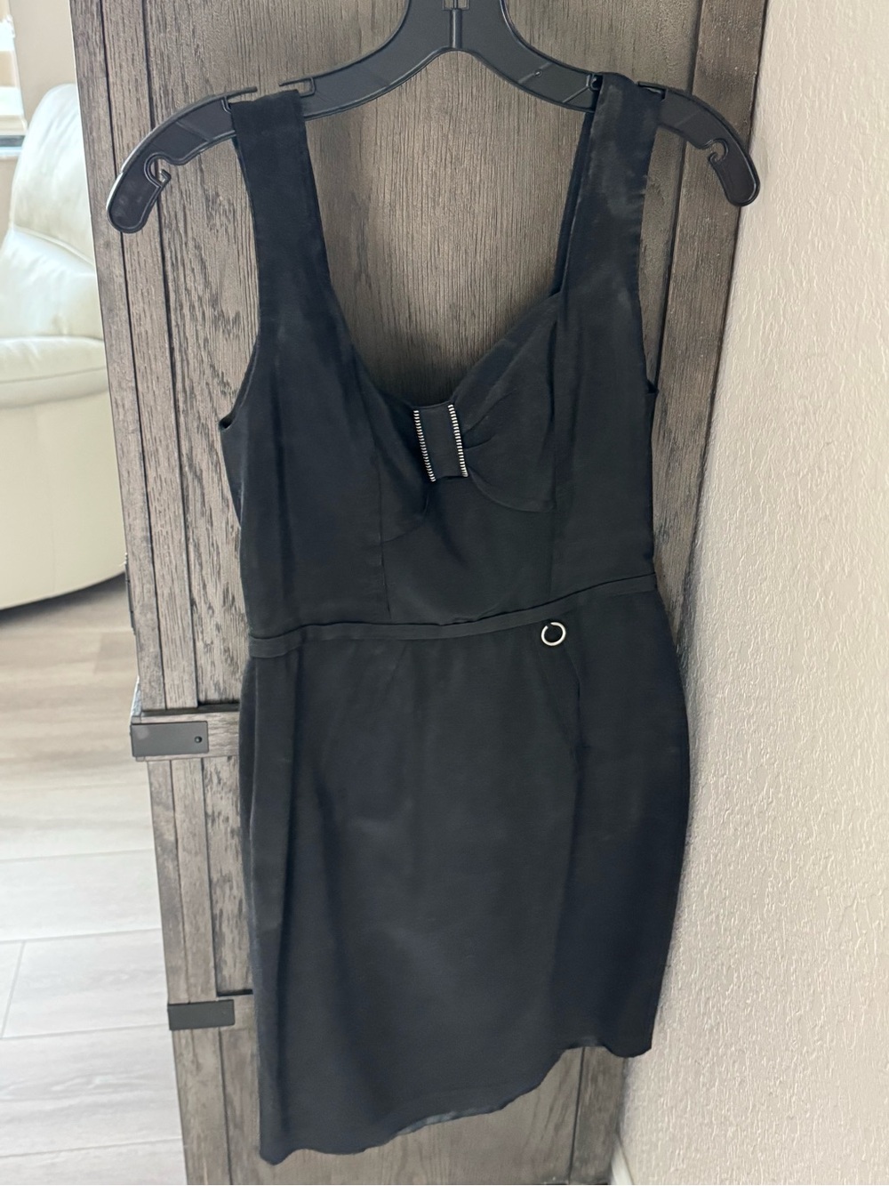 Yoana Baraschi Black Sleeveless Mini Dress with Bow Accent and Ring Detail